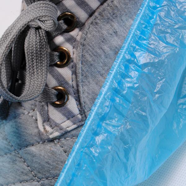 Engångsskoöverdrag 100 st Tjockare Plast Vattentät Regnöverdrag