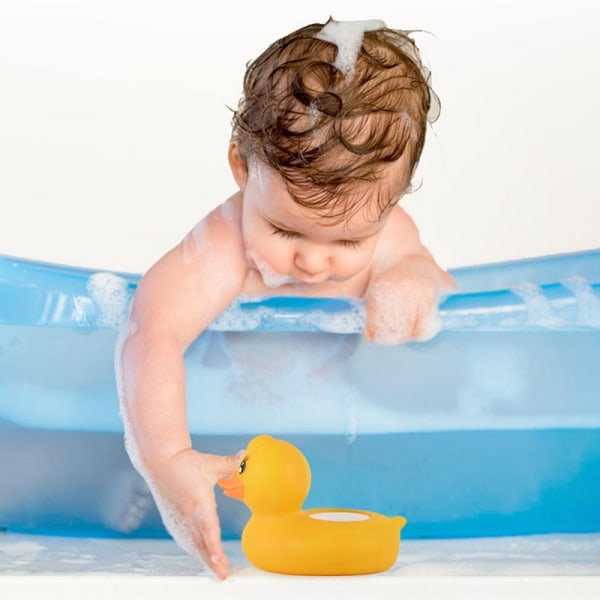 Lille gul and digitalt vandtermometer og babybadelegetøj
