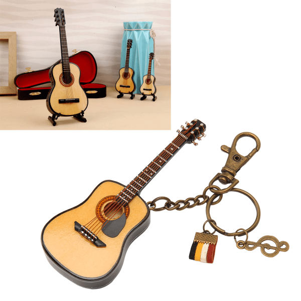 Minikitaran malli avaimenperätoiminto tasoittaa puuta runsaasti yksityiskohtia miniatyyri puinen kitara pöytähyllyyn