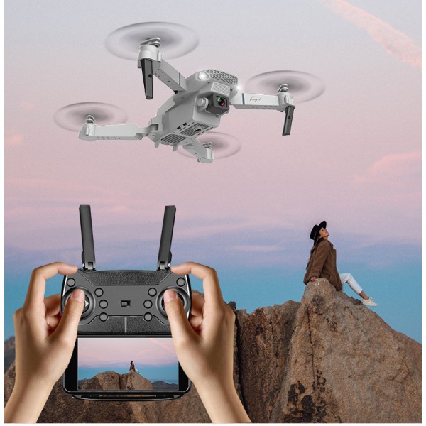 E88 Mini-taitettava drone , jossa on 4K-kamera, kaksoislinssi, GPS-paikannus ja vakaa lento korkealaatuiseen ilmakuvaukseen ja videotallennukseen laukun kanssa
