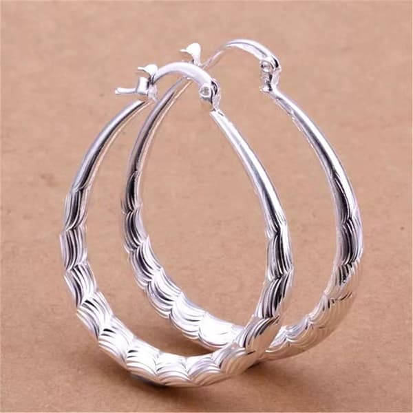 Guldpläterade creoler för damer med vågdesign, silver creoler