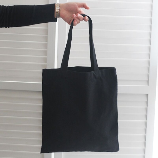1 axelväska i canvas 35*40cm svart black