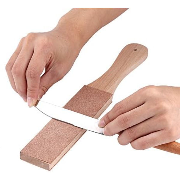 Slipsten av läder med trähandtag