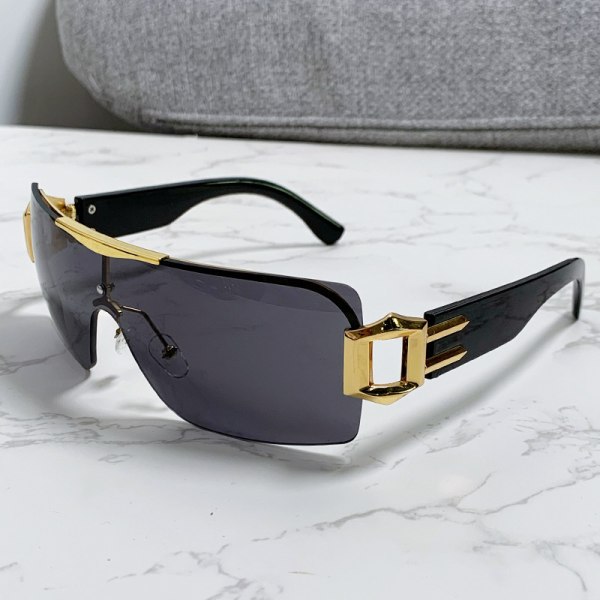 Personlighetssolglasögon i ett stycke Y2K futuristiska båglösa trendsolglasögon ihåliga Gold frame all gray pieces