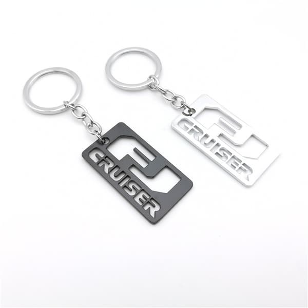 FJ CRUISER Nyckelring i legerad metall (svart+vit), presentidéer/fan så