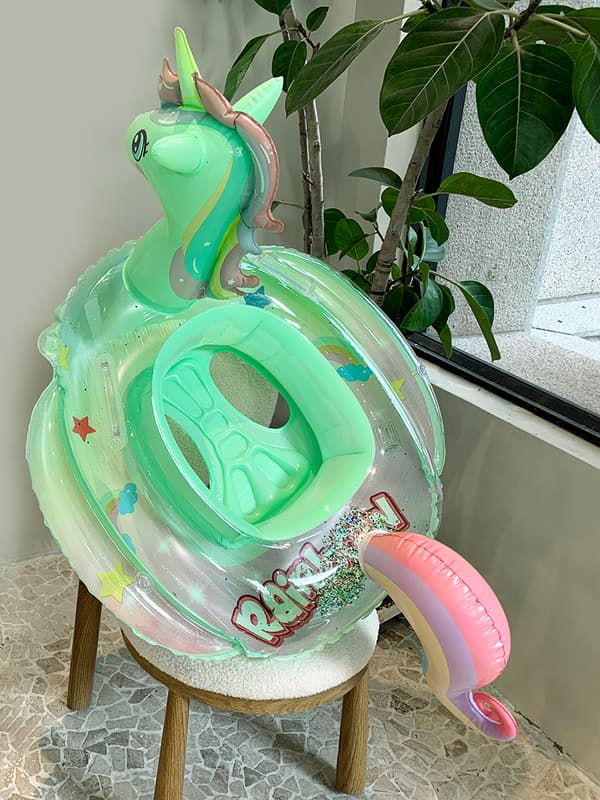 Baby barn simcirkel sitter regnbåge häst simning Inflata