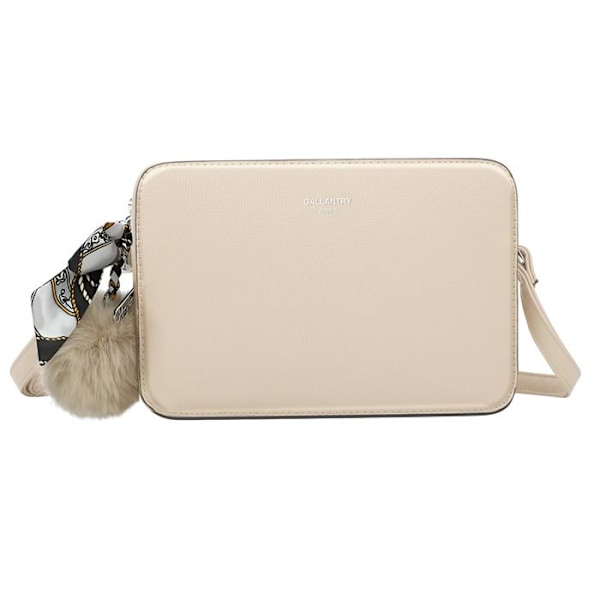 Olkalaukku naisille, koristeltu pompomin ja beigen huivin kanssa. Beige