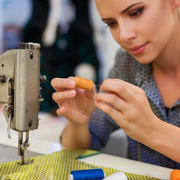 2 kpl (noin 3,8 * 3,1 cm) Nahkasormustin Käsisormustin Sormisuoja Sormisuojat Tikkupeitto Ompelutarvikkeet DIY Ompelutyökalut