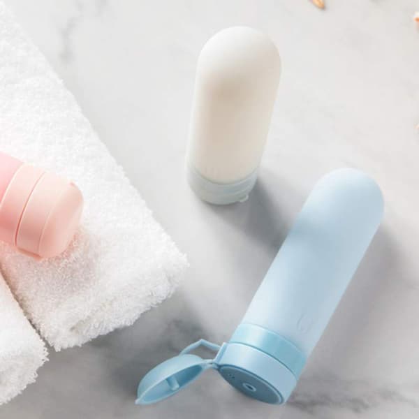 45ML Bärbara påfyllningsbara flaskor i silikon för resor Kosmetika Schampo Duschgel Klämflaskor Lotion Schampo Badbehållare