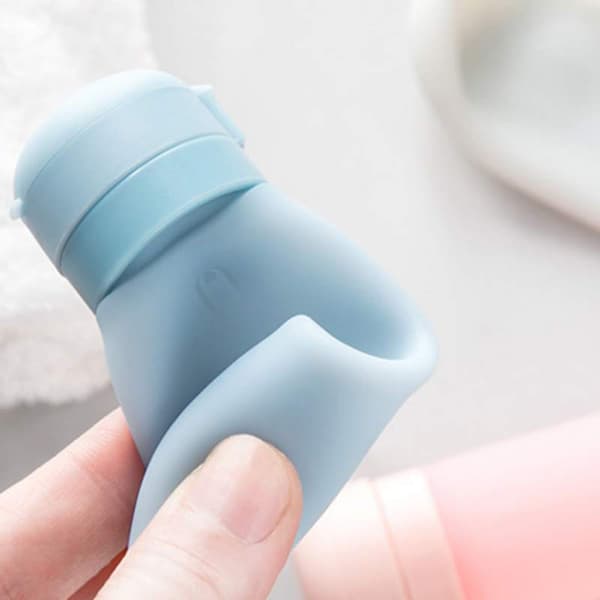 45ML Bärbara påfyllningsbara flaskor i silikon för resor Kosmetika Schampo Duschgel Klämflaskor Lotion Schampo Badbehållare