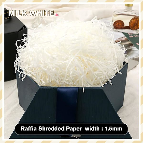 Vitt raffia strimlat papper - 100g, perfekt för presentkorgar och festdekorationer