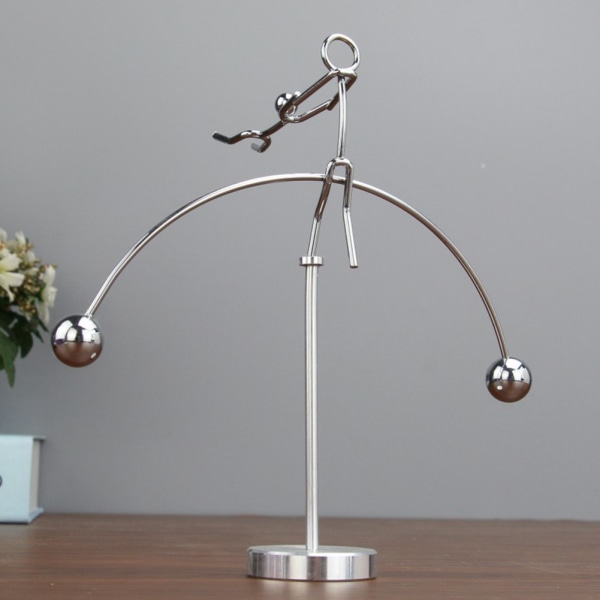 Metalli tasapainottava heiluri, 2 henkilöä tanssii Innovatiivinen stress relief lelu toimistotyöpöytälahja