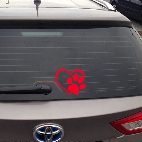 2 kappaletta autotarra - Tassu-kuvio mustalla sydämellä.
