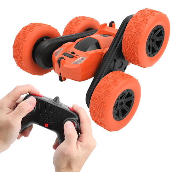 Kaksipuolinen temppuilu RC-auto 360 asteen pyöriminen Suihkuttava kauko-ohjattava auto Lasten lelu (Oranssi)