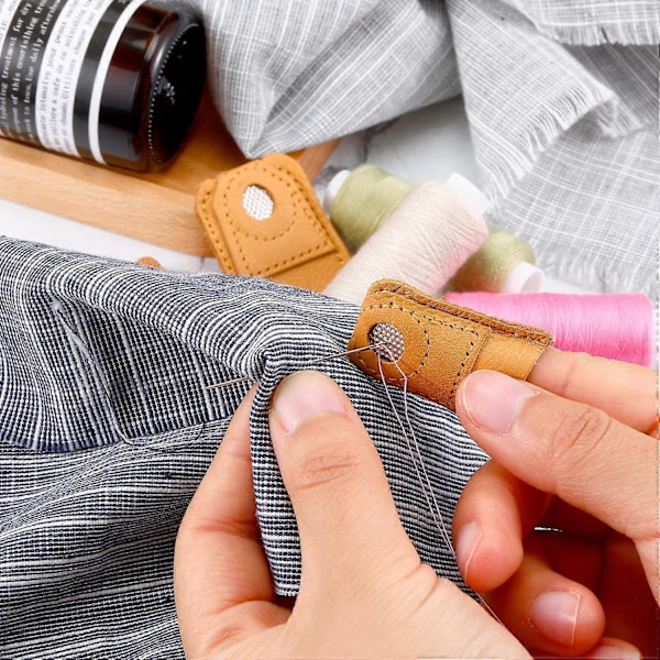 2 kpl (noin 3,8 * 3,1 cm) Nahkasormustin Käsisormustin Sormisuoja Sormisuojat Tikkupeitto Ompelutarvikkeet DIY Ompelutyökalut