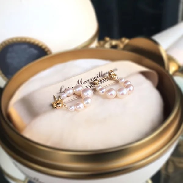 Nichedesignede perleøreringe, der betyder et par vintage øresmykker perleøreringe