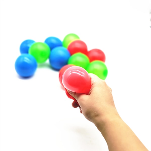 Vægdekompressionslegetøjsbold med limsugning