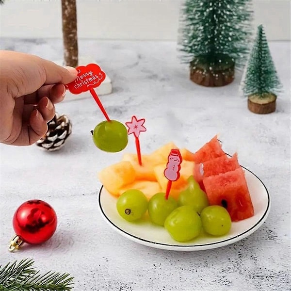Fruktplockar med jultema, set med fruktgafflar