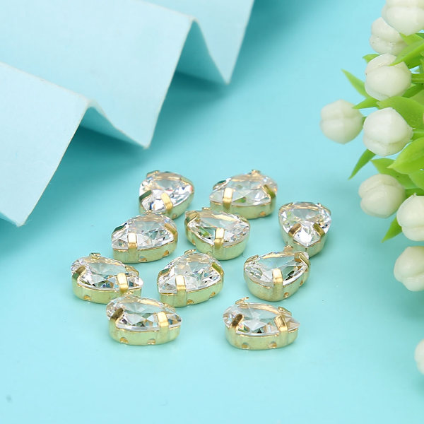 10 st sy rhinestones gyllene klo DIY rosett kläder tillbehör 7x10mm vit
