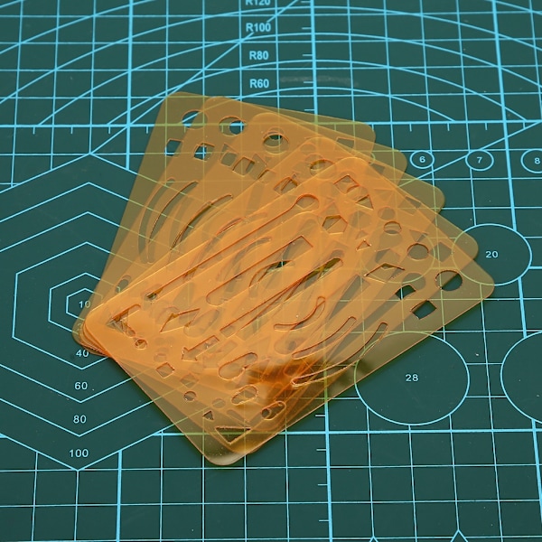 10 stk 27 hull viskelær skjold flerbruks ingeniørtegning mal linjal oransje
