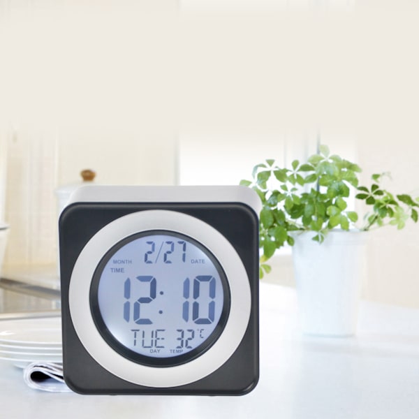 Stemmestyret baggrundsbelyst LCD-ur firkantet elektronisk ur med kalendertemperaturvisning sort