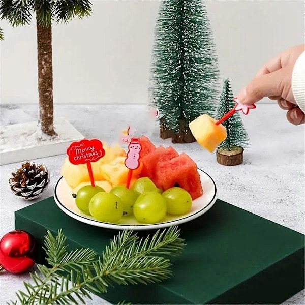 Fruktplockar med jultema, set med fruktgafflar