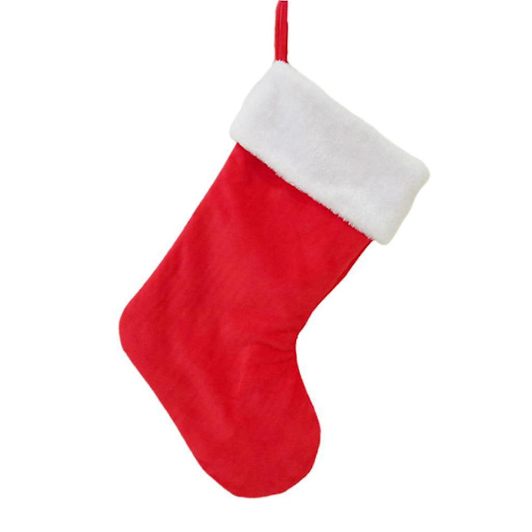 Klassisk röd och vit julstrumpa i sammet för juldekoration