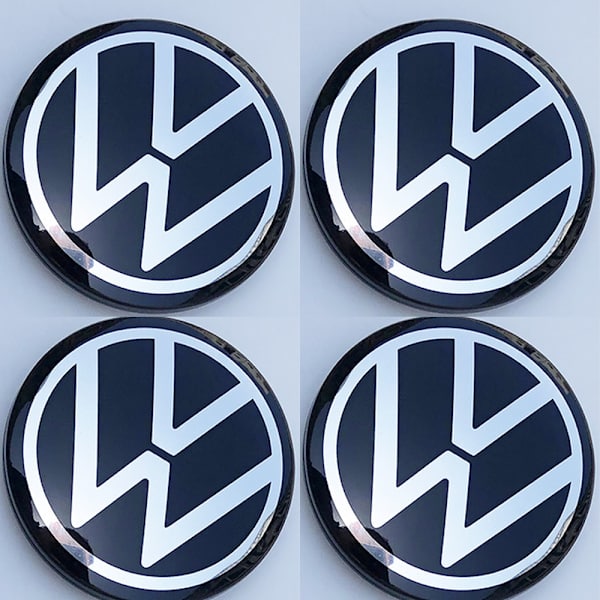 4 kpl uusia peiliä (65 mm) korvaavia vanteen keskipeitteitä Volkswagen Passat -vanteille