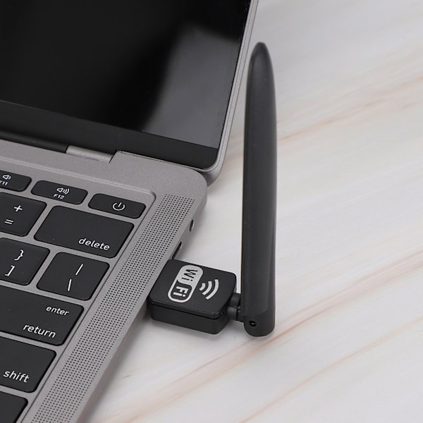 Kannettava musta USB2.0-liitäntäinen 2.4G langaton WiFi-sovitin, jossa merkkivalo