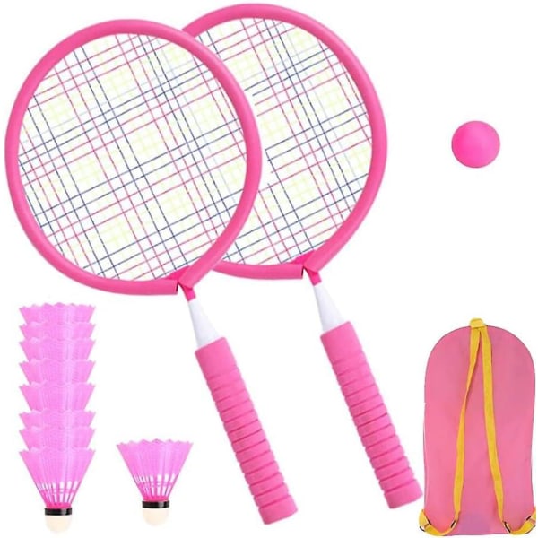 Lasten set vaaleanpunaisilla mailoilla ja tennispallolla