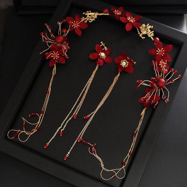 Brudesmykkesett med røde frynsede blomster, inkludert tiara, hårbånd og øredobber