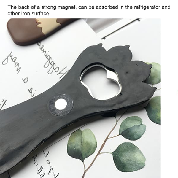 Bärbar flasköppnare i form av en kattass för glasölflaskor, kök