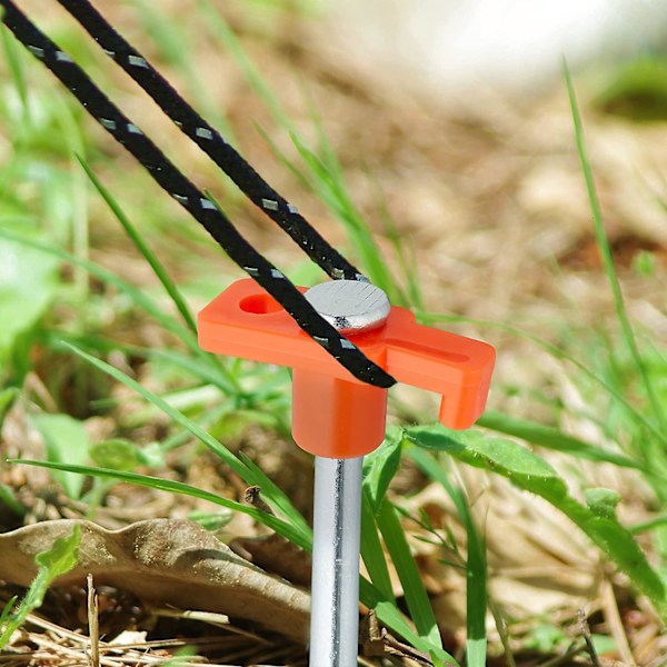Sarja 10 oranssia 25 cm:n galvanoitua kovaa lattia-ankkuria ja -tolppia