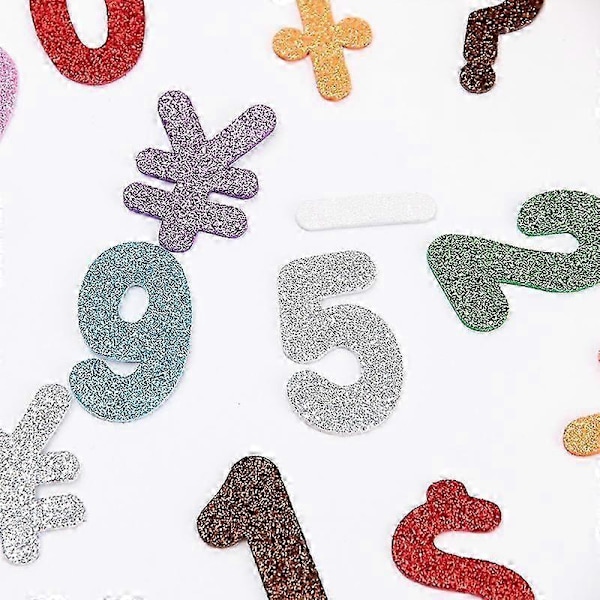 2 pakkausta pieniä aakkoskirjainvaahtomuovitarroja glitterillä, askartelutarvikkeita