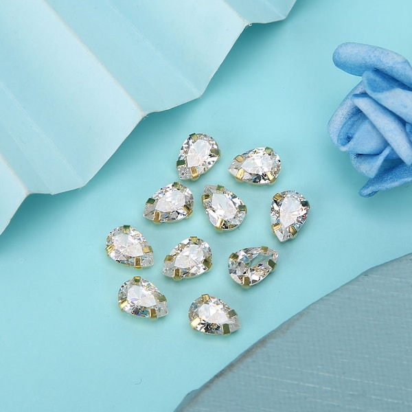 10 st sy rhinestones gyllene klo DIY rosett kläder tillbehör 7x10mm vit