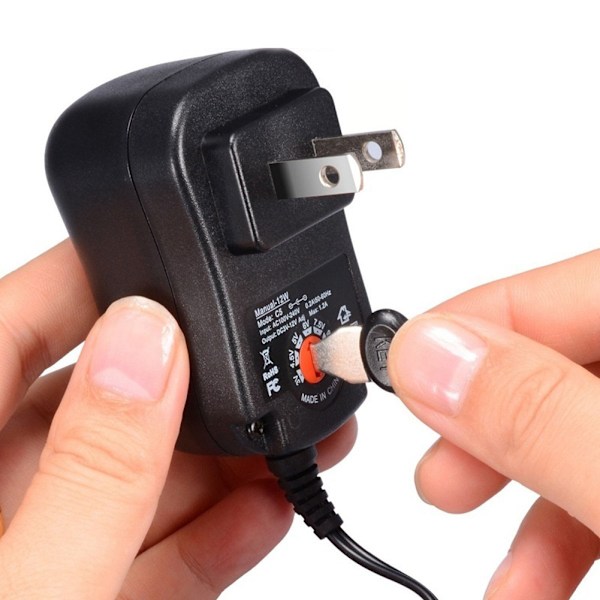 Universal 100-240V til 3V/4.5V/5V/6V/7.5V/9V/12V 12W Justerbar AC/DC Oplader Adapter Switching Strømforsyning