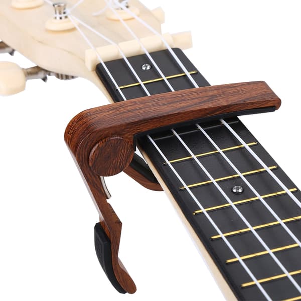 Akustiska och Elektriska Gitarrer Aluminiumlegering Snabbt Byte Gitarr Capo Instrument Tillbehör