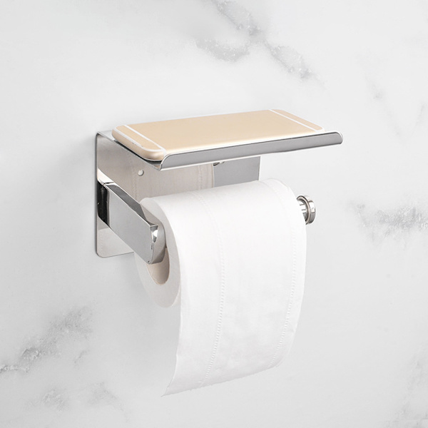 Ruostumattomasta teräksestä valmistettu seinälle kiinnitettävä WC-paperiteline, jossa on matkapuhelimen säilytyshylly