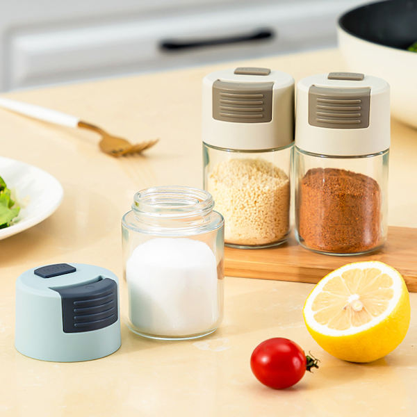 Trycktyp Salt Shaker Kryddburkar med lock Tät Dammsäker Kryddburk Glasflaska Köksredskap