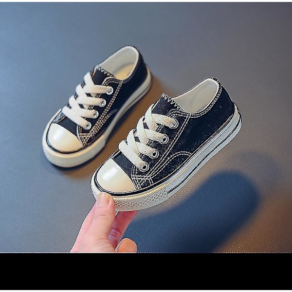 Trendiga vita sneakers i canvas för barn - mångsidiga och lediga skolsneakers med gratis frakt25 svart