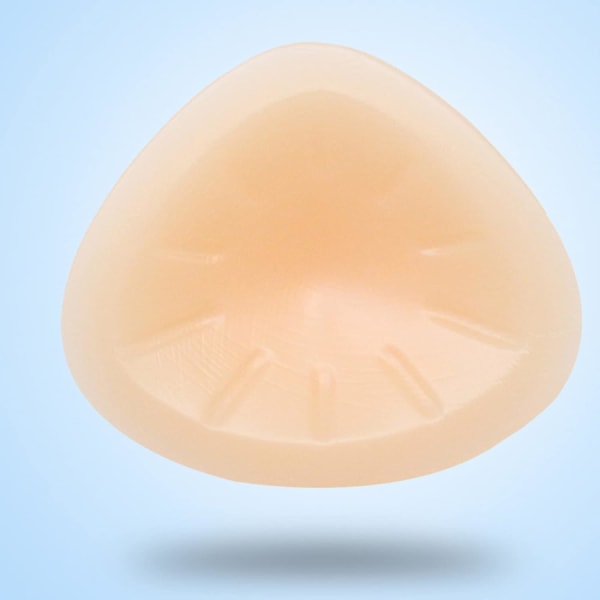 Silikoninen rintamalli, joka soveltuu ristikkäisiin pukeutuneisiin rinnanpoistoimplantit, epäsymmetrinen muoto, kolmiomainen, 200 g