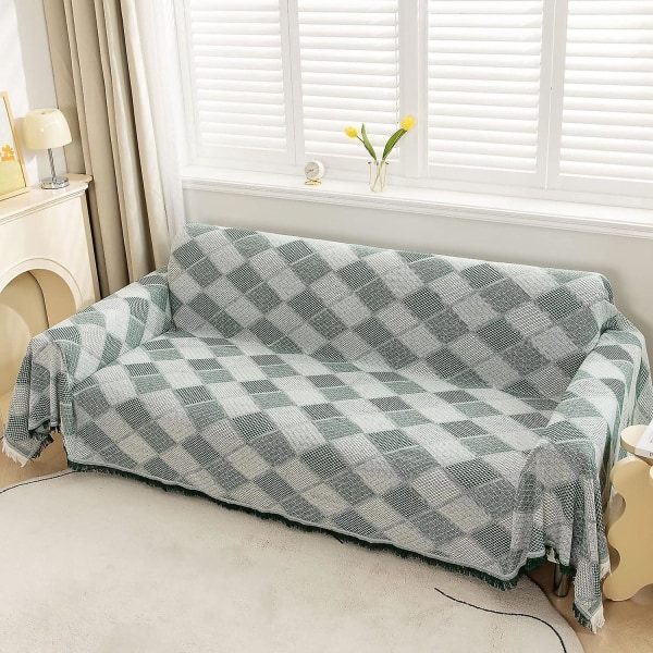 Vändbar grön plädsoffa med tofsar - 90x90 cm diamantmönster multifunktionell cover