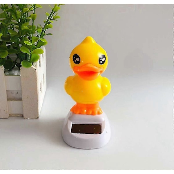Auton koristelutarvikkeet aurinkoenergialla toimiva auton koriste sarjakuva luova pään pudistus söpö pöllö harmaakarhu nukke lahja keltainen ankka