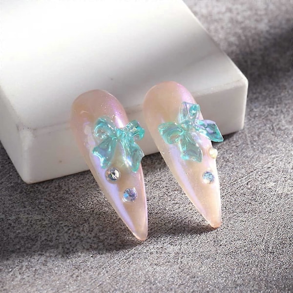 36 stk. 3D Aurora Resin Sløyfe Negledekorasjon Sommerfugl Sløyfe Neglepynt Fargerike Neglepynt Nagle Sett Fargerik Sløyfe for Neglekunst Design Neglekunst