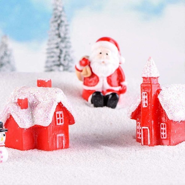 Mini Julbyhus skimrande snövilla dekorerad med 4 dockor