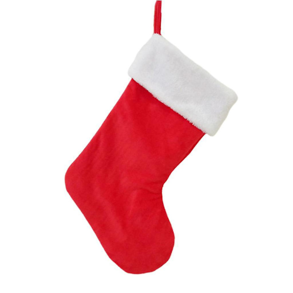 Klassisk röd och vit julstrumpa i sammet för juldekoration
