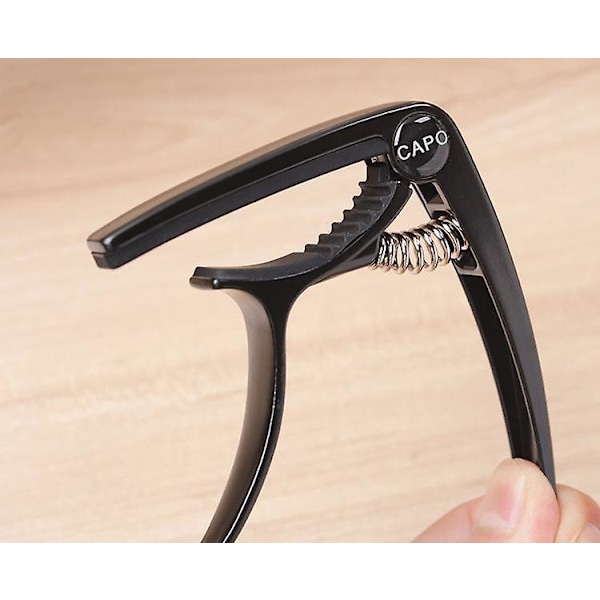Capo i sinklegering for akustisk/elektrisk/klassisk gitar