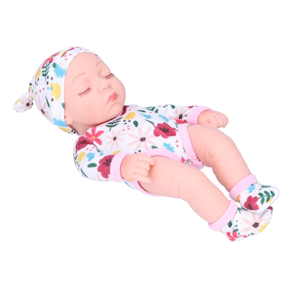Simulerad vinyl söt docka Reborn babydocka barn födelsedagspresent med färgglada kläder 25cmQ10-026