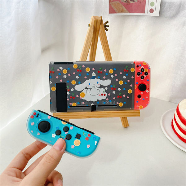 Skyddande spelskydd i tecknad serie genomskinlig delad fallskyddsskydd för Switch typ 4