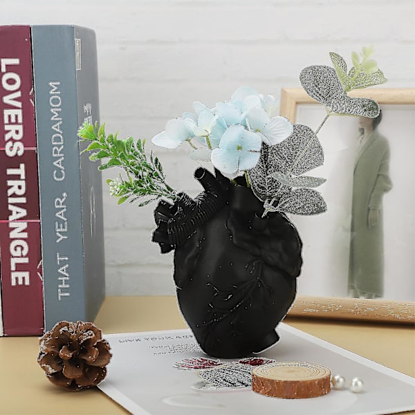 Elegant hartsformad vas i resin för heminredning